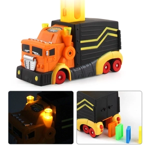 Detail view of electric domino train showing light-up chimney and automatic block dispensing
