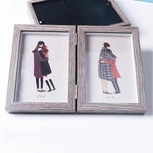 Foldable dual 4x6 wooden photo frame with grey-brown grain finish for home decor