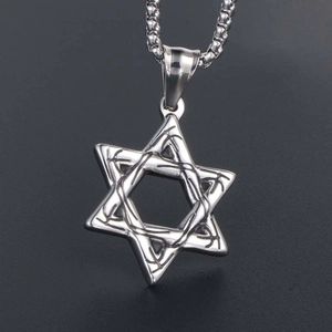 Vintage hollow hexagram pendant necklace in silver stainless steel on dark surface