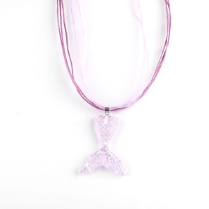 Detail of purple shimmering mermaid tail pendant on gradient gauze ribbon necklace