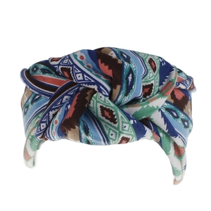 Detail of bohemian criss-cross headband with vibrant ethnic geometric patterns