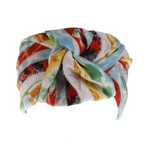 Detail of bohemian floral print headband featuring a twisted knot and ethnic geometric patterns