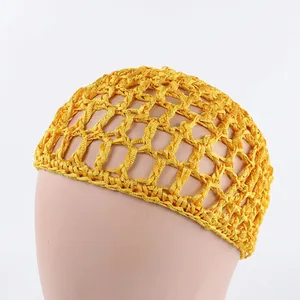 Detail of yellow crochet hairnet cap showing wide mesh pattern on a mannequin head