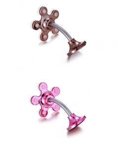 Close-up of flexible neck phone holders with silicone suction cups in rose gold and pink