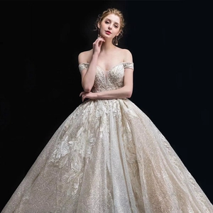 Luxury off-shoulder starry bridal gown with floral lace and shimmering sequins