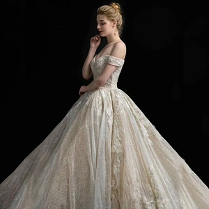Luxurious off-the-shoulder ball gown wedding dress with glitter lace and sequins