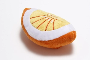 Close-up of plush orange slice pet toy showing detailed texture and embroidery