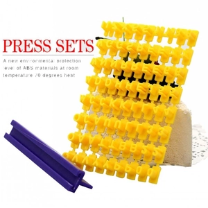 Alphabet and number cookie stamp set for DIY baking with yellow template and purple slider