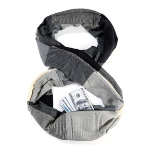 Close-up of soft plaid scarf with built-in pocket for phone and cash storage