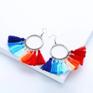 Silver hammered hoop earrings with colorful gradient fringe tassels in bohemian style