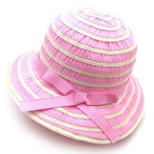 Detailed view of pink and white striped sun hat with a decorative satin ribbon bow