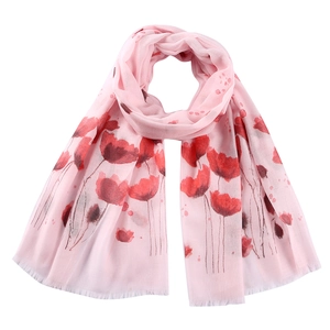 Close-up of pink lightweight scarf with vibrant red poppy flower print pattern