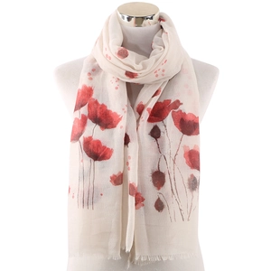 Detail of a lightweight floral scarf with red poppy prints on an off-white background