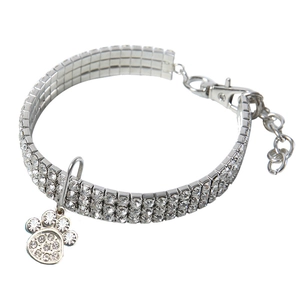 Detail of three-row rhinestone pet collar with paw pendant and lobster clasp