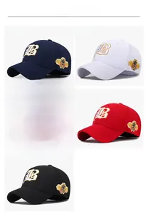 Detailed embroidery showcase of letter B and bee patch on multi-color baseball caps