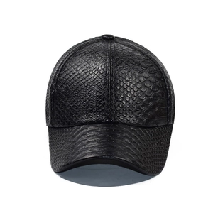 Front view of stylish black faux snakeskin leather baseball cap with crocodile texture