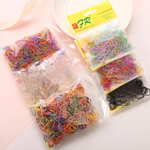 Detail showing various colorful TPU elastic hair bands packed in transparent poly bags
