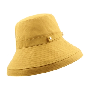 Mustard yellow wide brim cotton sun hat with decorative buckle and reinforced stitching