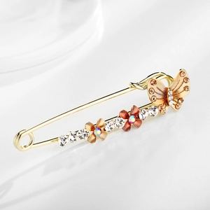Elegant gold metal butterfly and flower brooch with sparkling rhinestones for sweaters