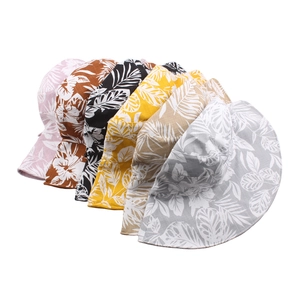 Women's reversible sun hat with tropical leaf print and wide brim in six assorted colors