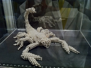 Macro detail of a 3D scorpion model built with silver 5mm magnetic balls puzzle