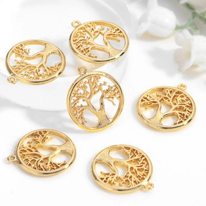Detailed view of six golden Tree of Life pendants for DIY jewelry crafting and design