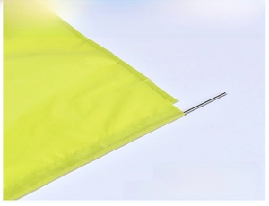 Detail of bedside storage bag showing the anti-slip metal support rod for stability