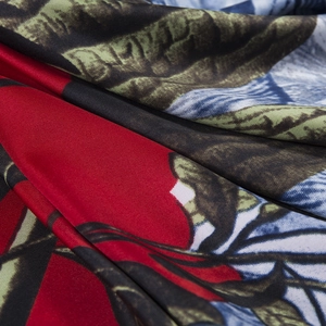 Detailed macro shot of 130cm floral twill scarf showing vibrant butterfly and flower patterns