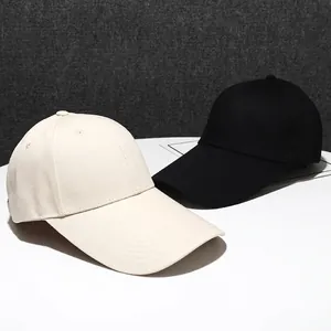 Classic cotton baseball caps in cream and black featuring an adjustable curved brim design