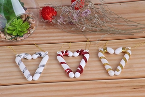 Three pairs of 7cm festive candy cane ornaments in silver, red, and gold for Christmas trees