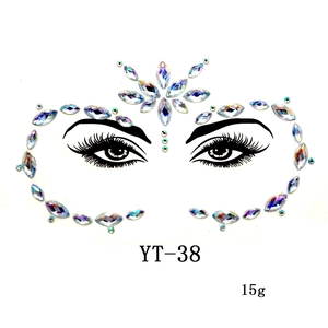 Macro shot of laser multicolor face gem stickers model YT-38 for masquerade makeup