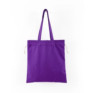 Detail of purple canvas tote bag with cream-colored drawstring closure and long handles