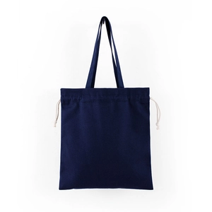 Close-up of deep blue canvas tote bag with drawstring handles on white background