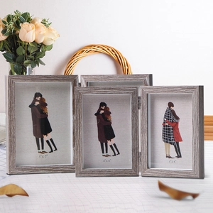 Three-frame foldable wooden picture frame in grey wood grain for 5x7 and 4x6 photos