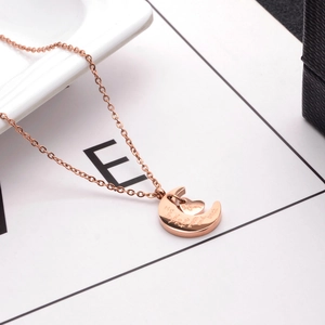 Rose gold moon and heart necklace with I love you to the moon and back and Mom engraving
