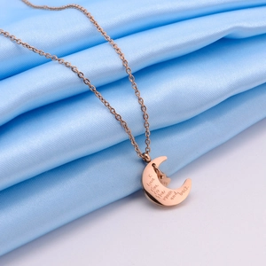 Rose gold moon and star pendant necklace with I Love You to the moon and back engraving