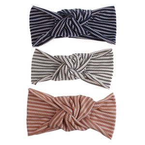 Three-piece set of chevron knit elastic headbands in navy, cream, and caramel colors