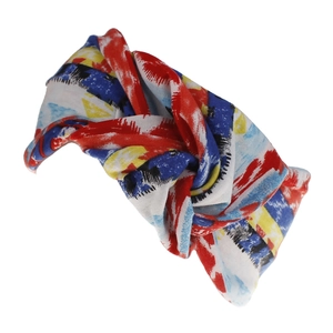 Detail of bohemian twisted headband featuring colorful abstract brushstroke pattern