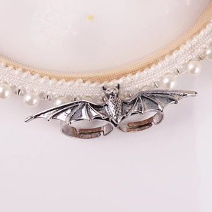 Gothic antique silver bat open ring for men and women on elegant pearl display