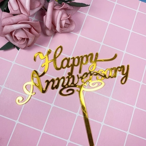 Gold acrylic Happy Anniversary cake topper with decorative pink roses background