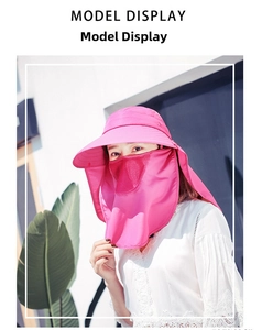 Dettaglio cappello parasole rosa con fori traspiranti sulla maschera rimovibile