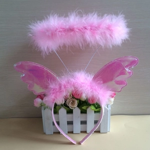 Close-up of pink feather angel halo and laser texture wing headband set for costumes