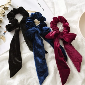 Elegant velvet hair scrunchies with long ribbons in black, blue, and wine red