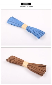 Close-up of blue and brown raffia paper ribbons for DIY gift wrapping and crafts