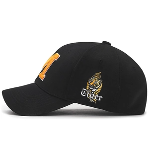 Black baseball cap featuring orange T patch and yellow tiger embroidery at 45 degree angle