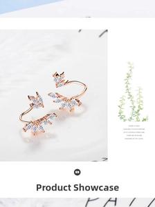 Detailed macro view of rose gold leaf earrings with white zircon cluster setting