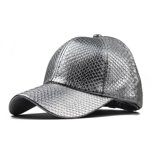 Macro view of metallic silver snakeskin texture on a faux leather baseball cap