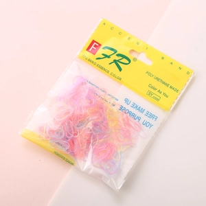 Detail view of colorful TPU elastic hair bands for girls in hanging bag packaging