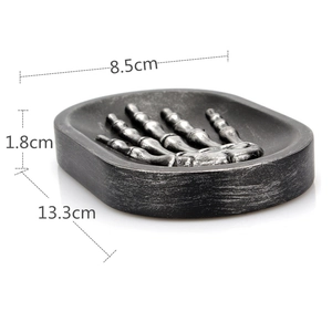 Detailed size view of skeleton hand soap tray with dimensions 13.3cm by 8.5cm by 1.8cm