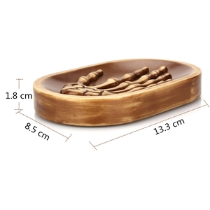 Detail view of gothic skeleton hand soap dish with dimensions 13.3cm x 8.5cm